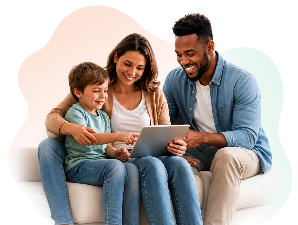 A family using a tablet together on the sofa